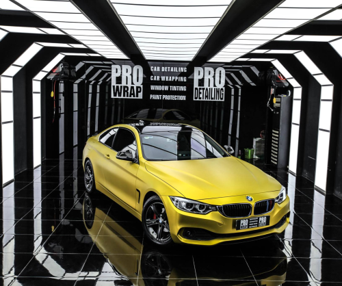 wrap xe - dán đổi màu xe BMW series 4 wrap satin chrome gold