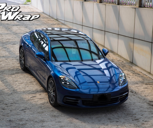 wrap xe, dán đổi màu xe Porsche Panamera wrap gloss deep blue metallic