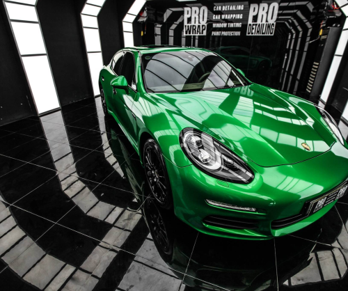 wrap xe, dán đổi màu xe Porsche Panamera wrap Gloss Green Metallic