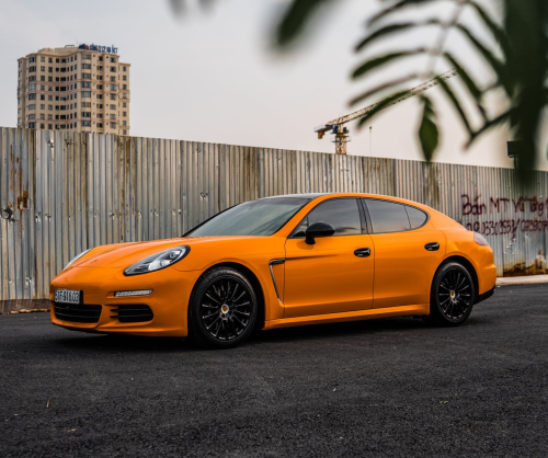 wrap xe, dán đổi màu xe Porsche Panamera wrap gloss Orange