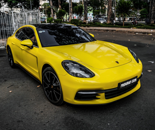 wrap xe, dán đổi màu xe Porsche Panamera wrap gloss yellow