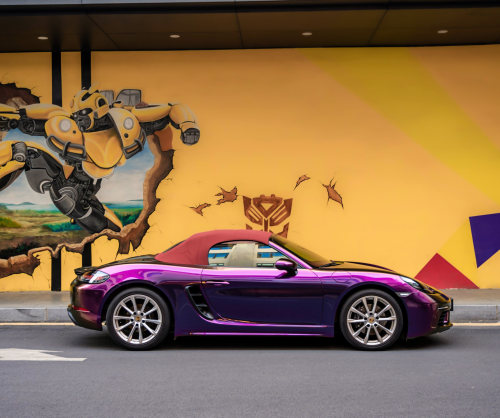 wrap xe, dán đổi màu xe Porsche 718 Boxster Wrap Gloss Crazy Grape