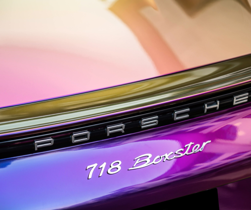 wrap xe, dán đổi màu xe Porsche 718 Boxster Wrap Gloss Crazy Grape