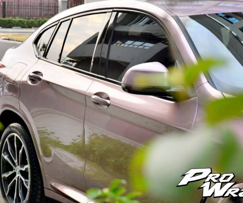 wrap xe - dán đổi màu xe BMW x4 wrap frozen berry metallic