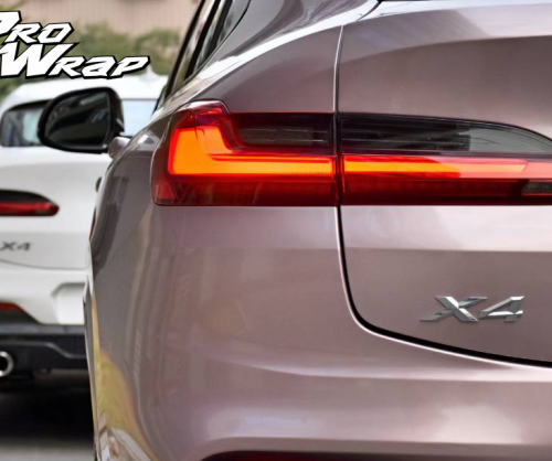 wrap xe - dán đổi màu xe BMW x4 wrap frozen berry metallic