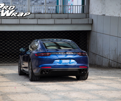 wrap xe, dán đổi màu xe Porsche Panamera wrap gloss deep blue metallic