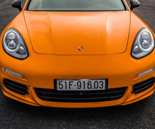 wrap xe, dán đổi màu xe Porsche Panamera wrap gloss Orange