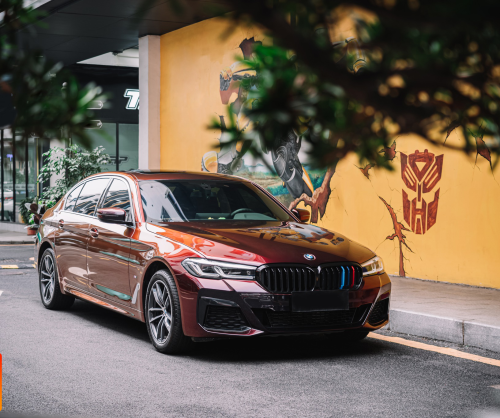 wrap xe, dán đổi màu xe BMW 7 series wrap gloss madeira red