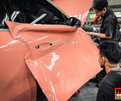 wrap xe, dán đổi màu xe Porsche Cayenne Wrap Gloss Piggy Bank