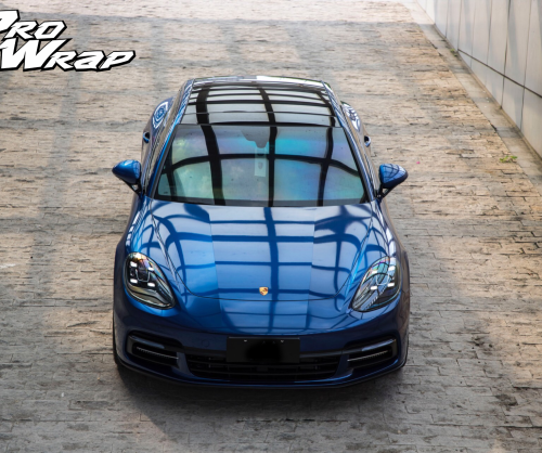 wrap xe, dán đổi màu xe Porsche Panamera wrap gloss deep blue metallic