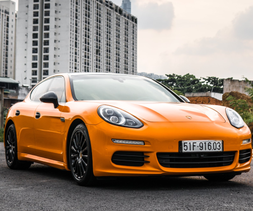 wrap xe, dán đổi màu xe Porsche Panamera wrap gloss Orange