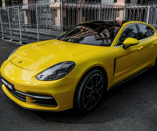 wrap xe, dán đổi màu xe Porsche Panamera wrap gloss yellow