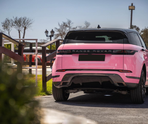 wrap xe, dán đổi màu xe Range Rover Evoque wrap gloss pink