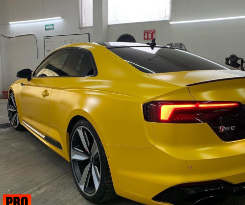 wrap xe, dán đổi màu xe Audi A5 wrap satin yellow metallic
