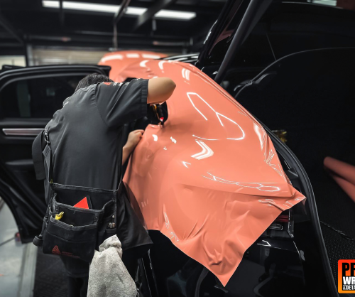 wrap xe, dán đổi màu xe Porsche Cayenne Wrap Gloss Piggy Bank