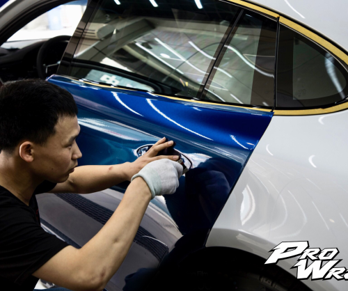 wrap xe, dán đổi màu xe Porsche Panamera wrap gloss deep blue metallic