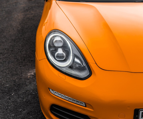 wrap xe, dán đổi màu xe Porsche Panamera wrap gloss Orange