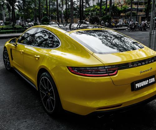 wrap xe, dán đổi màu xe Porsche Panamera wrap gloss yellow