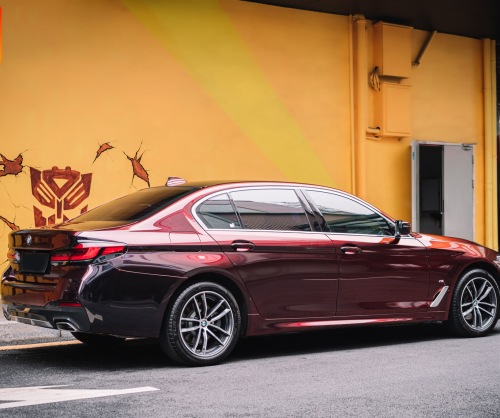 wrap xe, dán đổi màu xe BMW 7 series wrap gloss madeira red