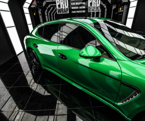 wrap xe, dán đổi màu xe Porsche Panamera wrap Gloss Green Metallic