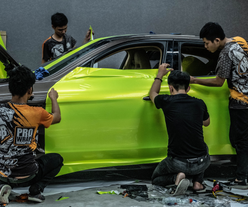 wrap xe, dán đổi màu xe Porsche Panamera wrap gloss magic apple green