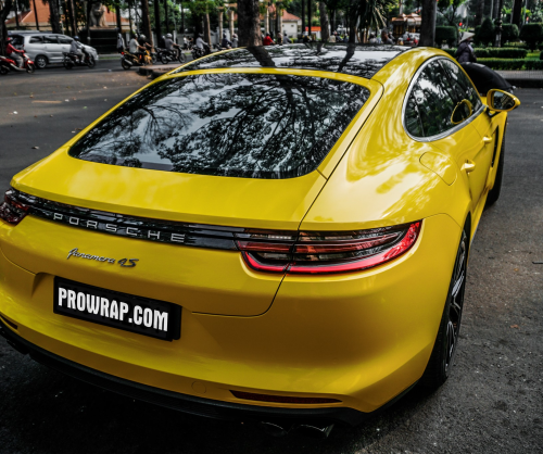 wrap xe, dán đổi màu xe Porsche Panamera wrap gloss yellow