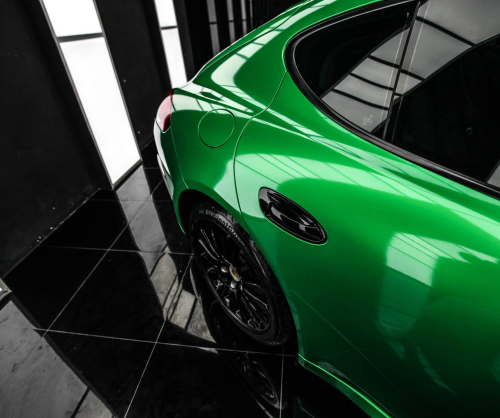 wrap xe, dán đổi màu xe Porsche Panamera wrap Gloss Green Metallic