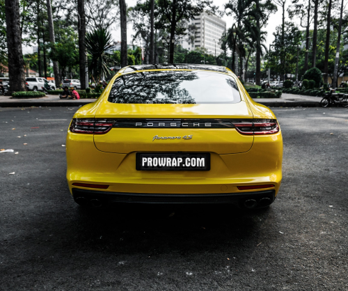 wrap xe, dán đổi màu xe Porsche Panamera wrap gloss yellow