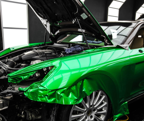 wrap xe, dán đổi màu xe Porsche Panamera wrap Gloss Green Metallic