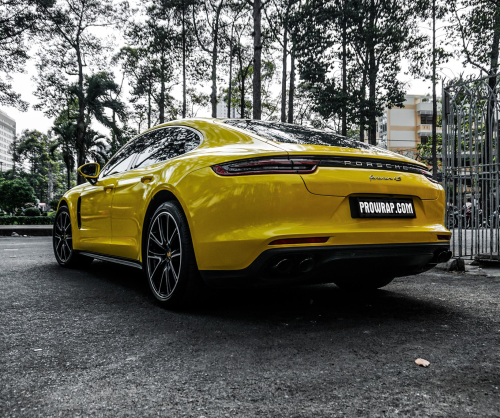 wrap xe, dán đổi màu xe Porsche Panamera wrap gloss yellow