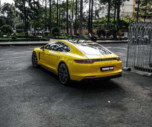 wrap xe, dán đổi màu xe Porsche Panamera wrap gloss yellow