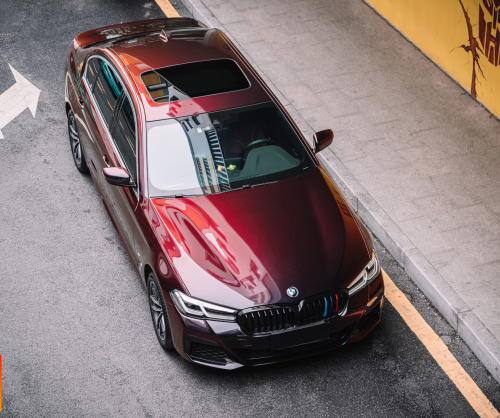 wrap xe, dán đổi màu xe BMW 7 series wrap gloss madeira red