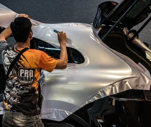 wrap xe, dán đổi màu xe Porsche Cayenne wrap gloss pearl white
