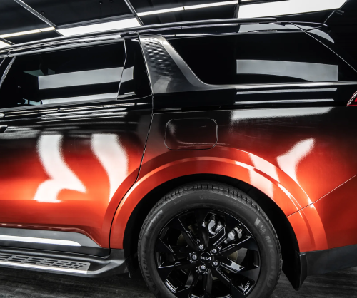 Dán đổi màu xe Kia Carnival Ombre Orange & Black