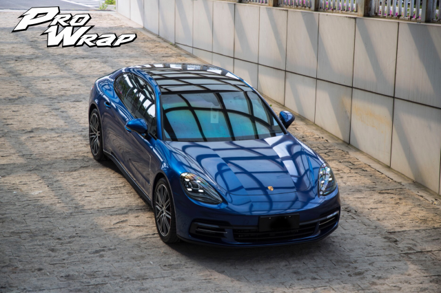 wrap xe, dán đổi màu xe Porsche Panamera wrap gloss deep blue metallic