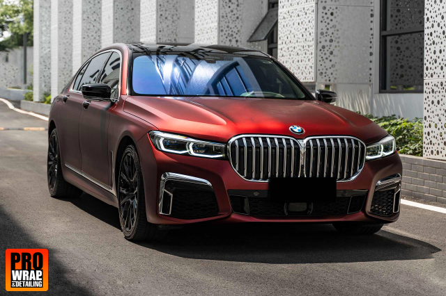 wrap xe - dán đổi màu xe BMW series 7 wrap satin dragon red