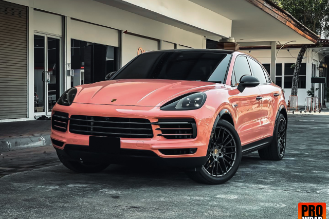 wrap xe, dán đổi màu xe Porsche Cayenne Wrap Gloss Piggy Bank