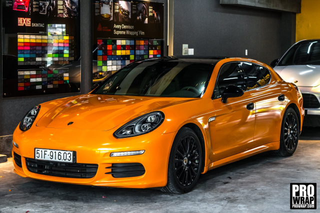 wrap xe, dán đổi màu xe Porsche Panamera wrap gloss Orange