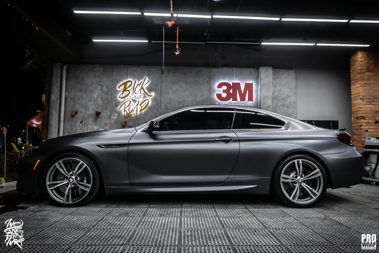 Dán đổi màu xe BMW 650i Coupe Satin Dark Gray Metallic góc sideview